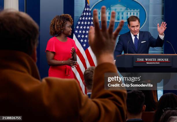 White House National Security Communications Advisor John Kirby and Press Secretary Karine Jean-Pierre talk to reporters during the daily news...