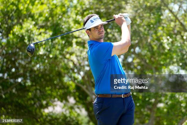 Beau Hossler of the United States plays his tee shoot on the 18th hole during the first round of the Valero Texas Open at TPC San Antonio on April...