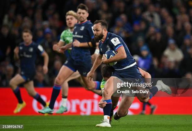 Dublin , Ireland - 6 April 2024; Jamison Gibson-Park of Leinster evades the tackle of Freddie Steward of Leicester Tigers on his way to scoring his...