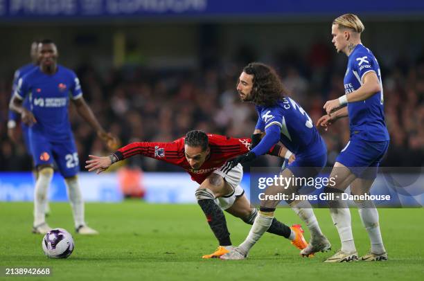 Marc Cucurella of Chelsea pulls Antony of Manchester United during the Premier League match between Chelsea FC and Manchester United at Stamford...