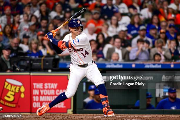 Mauricio Dubon of the Houston Astros bats against the Toronto Blue Jays at Minute Maid Park on April 03, 2024 in Houston, Texas.