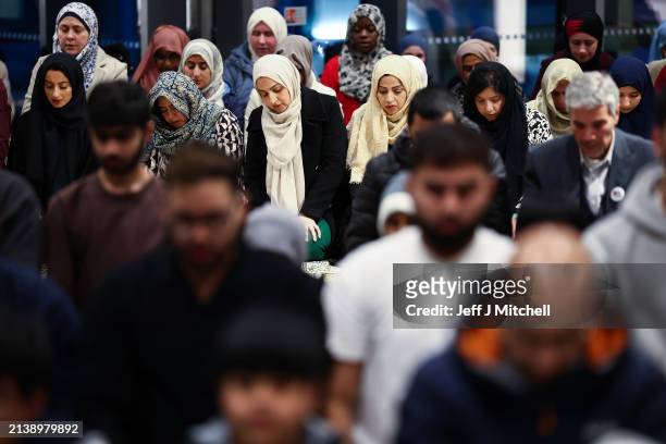 Members of the Muslim community pray during an Iftar event in the V&A museum on April 04, 2024 in Dundee, Scotland. Open Iftar is organised by the...