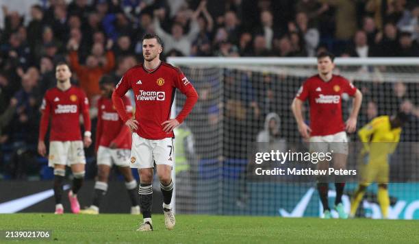 Mason Mount of Manchester United reacts to Cole Palmer of Chelsea scoring their fourth goal during the Premier League match between Chelsea FC and...