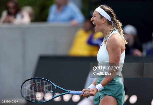 Victoria Azarenka of Belarus celebrates her match Taylor Townsend of the United States in the second set on Day 4 of the WTA Tour at Credit One...