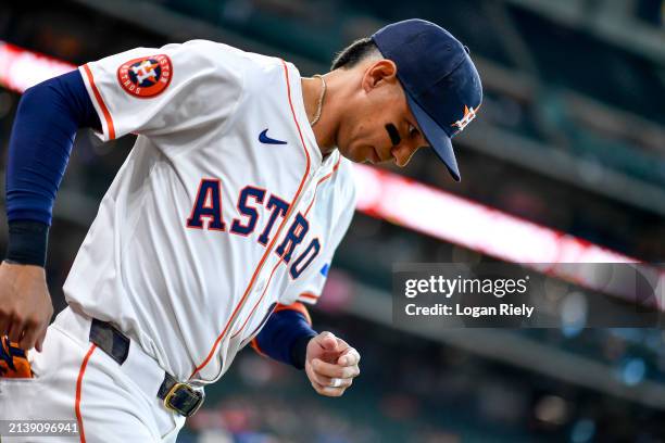 Mauricio Dubon of the Houston Astros runs from the dugout prior to the game against the Toronto Blue Jays at Minute Maid Park on April 03, 2024 in...