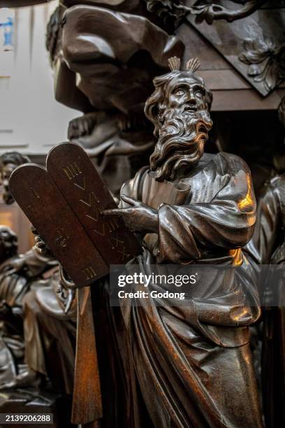 Notre Dame du Finisterre catholic church, Brussels, Belgium. Sculptural group around Moses and the 10 Commandments.