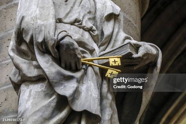 Saints Michael & Gudule cathedral, Brussels, Belgium. Saint Peter statue detail .