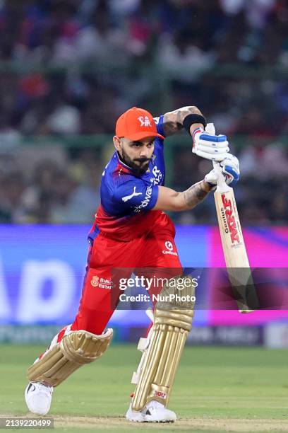 Virat Kohli of Royal Challengers Bengaluru is playing a shot during the Indian Premier League 2024 T20 cricket match between Rajasthan Royals and...