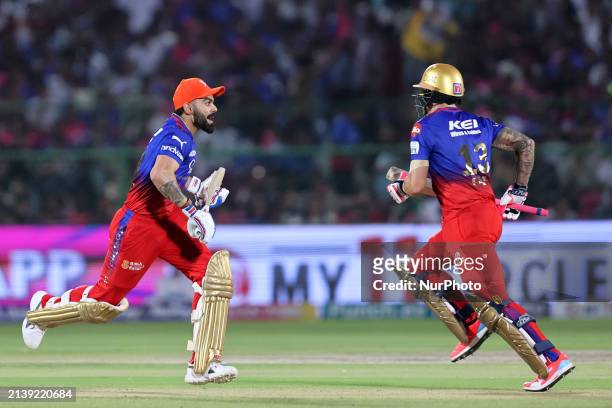 Royal Challengers Bangalore's batters Virat Kohli and Faf du Plessis are running between the wickets during the Indian Premier League 2024 T20...
