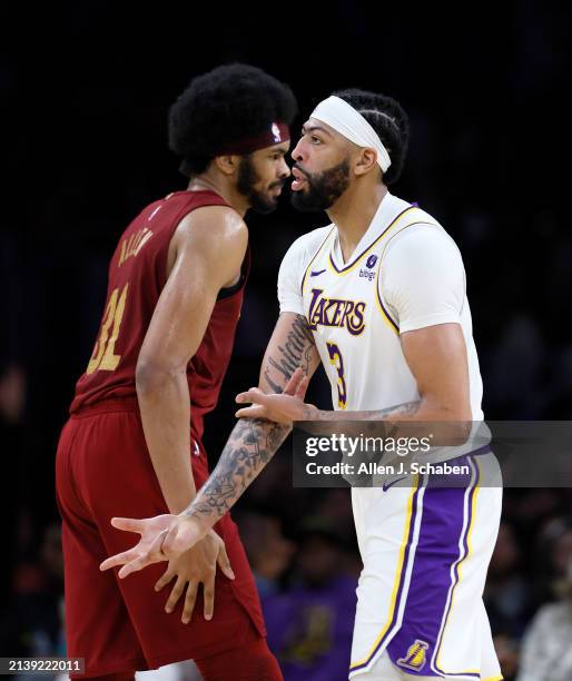 Los Angeles, CA Lakers forward Anthony Davis, #3, right, celebrates his three-point basket as Cavaliers center Jarrett Allen, looks away in the...