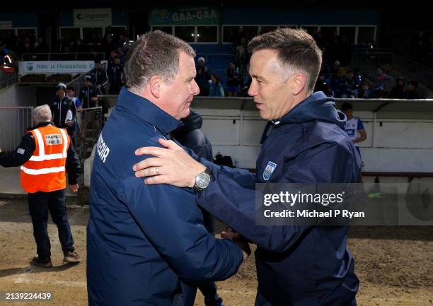 Waterford , Ireland - 7 April 2024; Tipperary manager Paul Kelly, left, shakes hands with Waterford manager Paul Shankey after the Munster GAA...