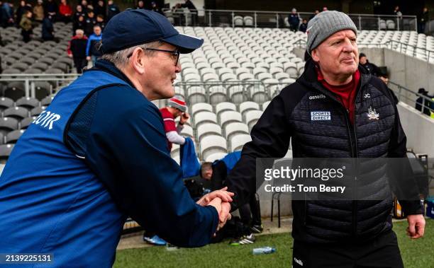 Cork , Ireland - 7 April 2024; Limerick manager Jimmy Lee shakes hands with Cork manager John Cleary after the Munster GAA Football Senior...