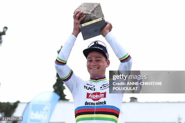 Alpecin - Deceuninck team's Dutch rider Mathieu Van Der Poel celebrates on the podium after winning the 121st edition of the Paris-Roubaix one-day...