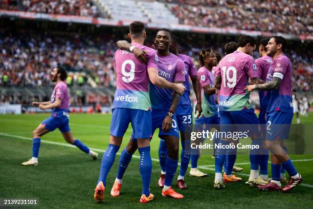 Olivier Giroud of AC Milan celebrate with teammates after scoring a goal during the Serie A football match between AC Milan and US Lecce. AC Milan...