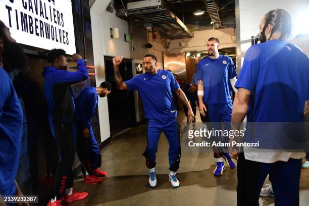 Norman Powell of the LA Clippers high fives teammates before the game against the Cleveland Cavaliers on April 7, 2024 at Crypto.Com Arena in Los...