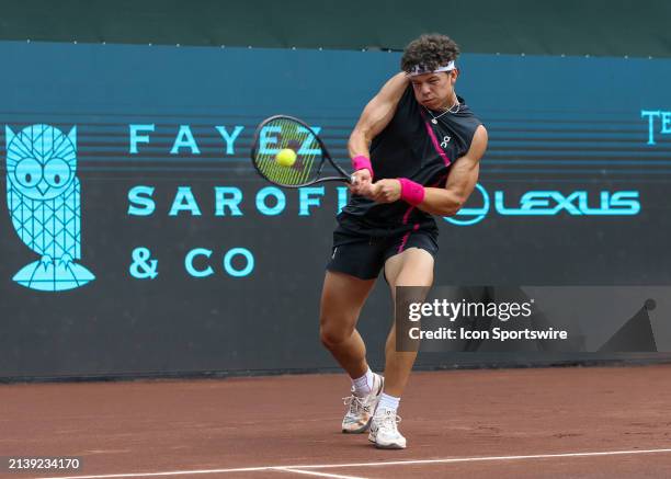 Ben Shelton hits the return during the singles final match of the US Clay Court Championships on April 7, 2024 at River Oaks Country Club in Houston,...