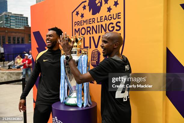 Sir Mo Farah and Daniel Sturridge with the The Premier League Trophy during the Premier League Mornings Fan Fest on April 6, 2024 in Nashville,...