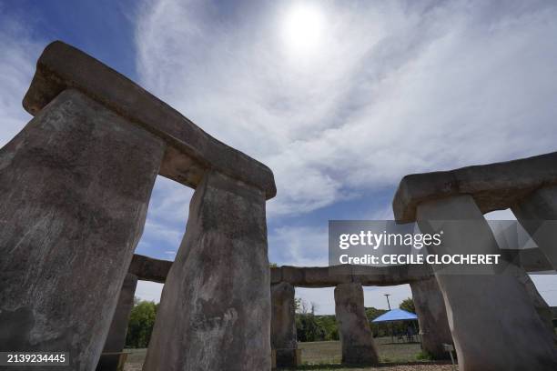 View of Stonehenge II, a concrete sculpture built as an homage to the original Stonehenge, where visitors and campers await Monday's total solar...