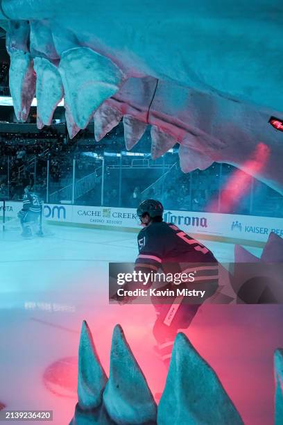 Collin Graf of the San Jose Sharks takes the ice through the Shark Head before the game against the Arizona Coyotes at SAP Center on April 7, 2024 in...