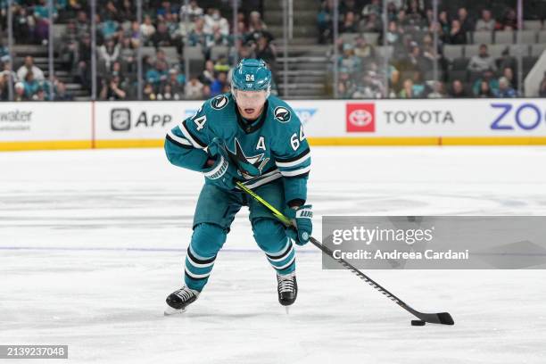Mikael Granlund of the San Jose Sharks skating with the puck against the Arizona Coyotes at SAP Center on April 7, 2024 in San Jose, California.
