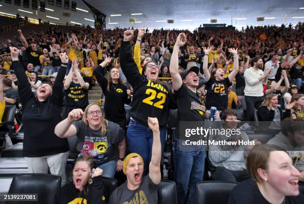 Fans watch the match-up between the South Carolina Gamecocks and the Iowa Hawkeyes during the 2024 NCAA Division 1 Women's Basketball Championship at...