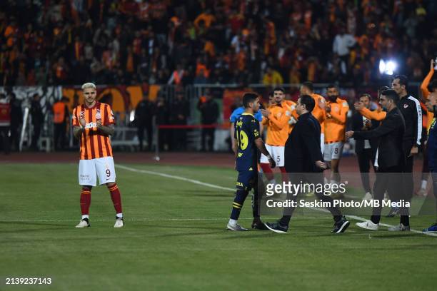 Mauro Icardi of Galatasaray applauds as the Fenerbahce players head to the dressing room during the Turkish SuperCup match between Galatasaray and...