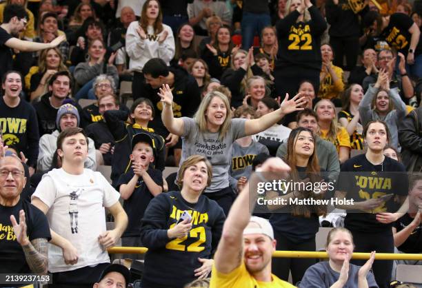 Fans watch the match-up between the South Carolina Gamecocks and the Iowa Hawkeyes during the 2024 NCAA Division 1 Women's Basketball Championship at...