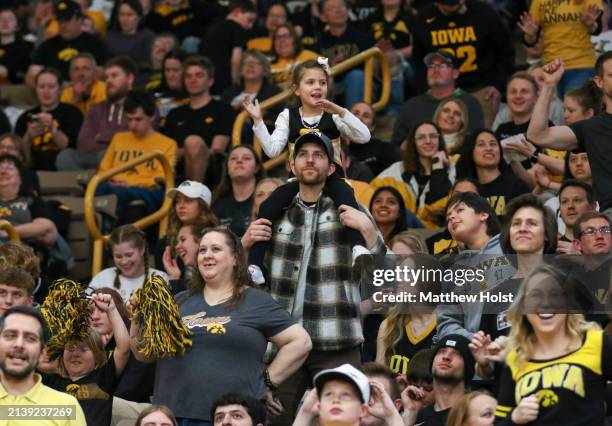 Fans watch the match-up between the South Carolina Gamecocks and the Iowa Hawkeyes during the 2024 NCAA Division 1 Women's Basketball Championship at...