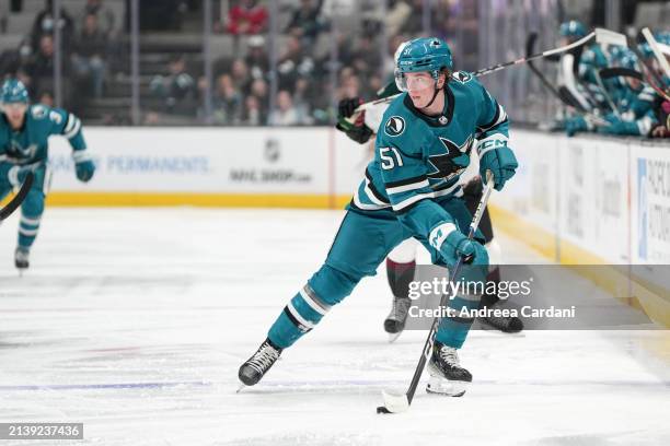 Collin Graf of the San Jose Sharks skating with the puck against the Arizona Coyotes at SAP Center on April 7, 2024 in San Jose, California.