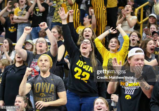 Whitney Olson, of Galva, Ill cheers along with fans watching the match-up between the South Carolina Gamecocks and the Iowa Hawkeyes during the 2024...