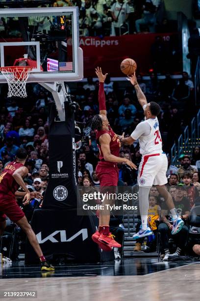 Norman Powell of the LA Clippers shoots the ball during the game against the Cleveland Cavaliers on April 7, 2024 at Crypto.Com Arena in Los Angeles,...