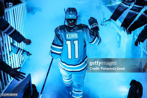 Luke Kunin of the San Jose Sharks enters the ice before a game against the Arizona Coyotes at SAP Center on April 7, 2024 in San Jose, California.