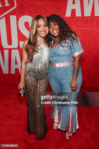 Mickey Guyton and Brittney Spencer at the 2024 CMT Music Awards held at the Moody Center on April 7, 2024 in Austin, Texas.