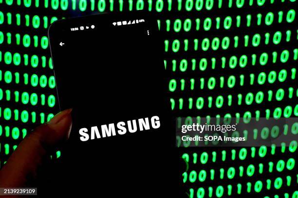 In this photo illustration, a Samsung Logo seen displayed on a smartphone.