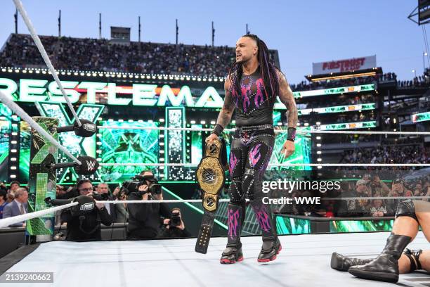 Damian Priest celebrates his WWE World Championship win over Drew McIntyre during Night Two of WrestleMania 40 at Lincoln Financial Field on April 7,...