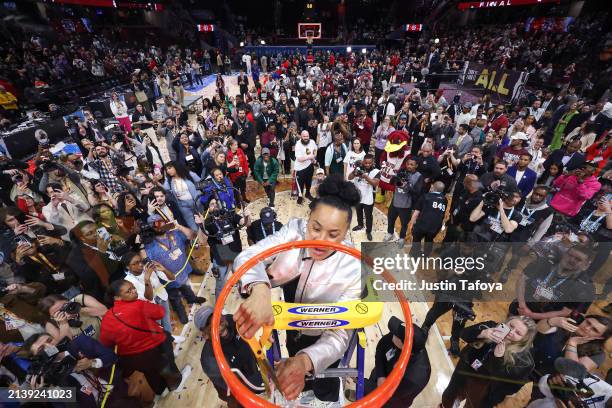 Head coach Dawn Staley of the South Carolina Gamecocks cuts the net after defeating the Iowa Hawkeyes during the NCAA Women's Basketball Tournament...