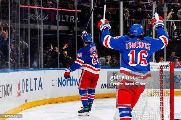 Chris Kreider of the New York Rangers celebrates with teammates after scoring a goal in the third period against the Montreal Canadiens at Madison...