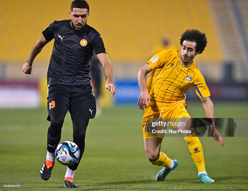 Al Garafa Ahmed Alaaeildin Abdelmotaal of Al-Gharafa SC is battling for the ...