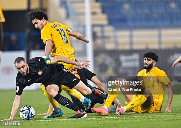 Al Garafa Ahmed Alaaeildin Abdelmotaal of Al-Gharafa SC is battling for the ...