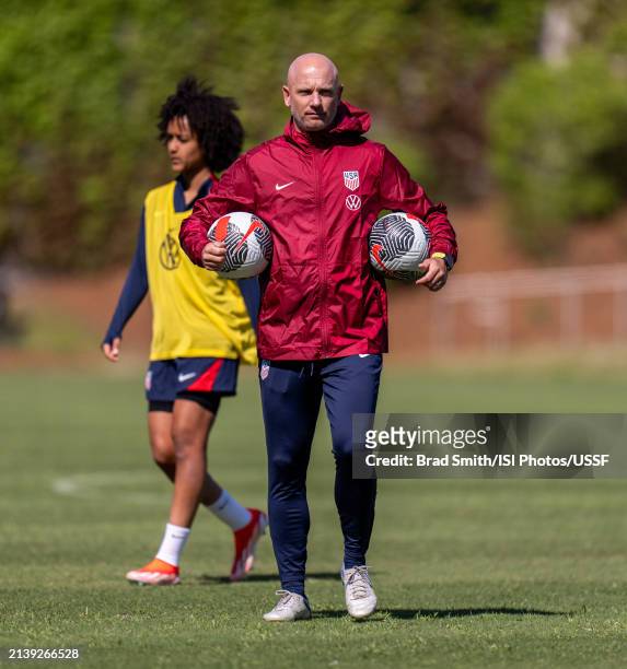Philip Poole of the United States watches the team during USWNT training at Children's Healthcare of Atlanta Training Ground on April 4, 2024 in...