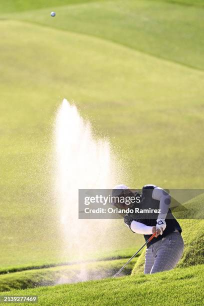 Ariya Jutanugarn of Thailand plays a bunker shot on the seventh hole on day two of the T-Mobile Match Play presented by MGM Rewards at Shadow Creek...