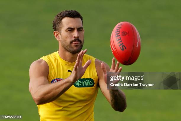 Jack Graham of the Tigers marks the ball during a Richmond Tigers AFL training session at Punt Road Oval on April 05, 2024 in Melbourne, Australia.