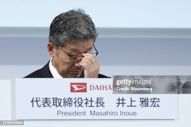 Masahiro Inoue, president of Daihatsu Motor Co., adjusts his glasses during a news conference in Tokyo, Japan, on Monday, April 8, 2024. Toyota Motor...
