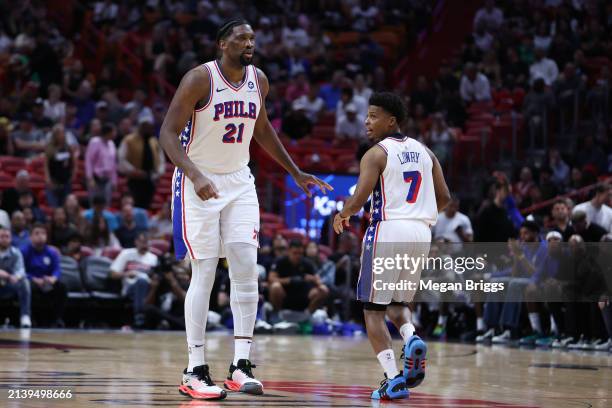 Joel Embiid and Kyle Lowry of the Philadelphia 76ers react during the third quarter of the game against the Miami Heat at Kaseya Center on April 04,...