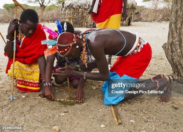 Samburu Men Lighting A Fire, Samburu County; Kenya.