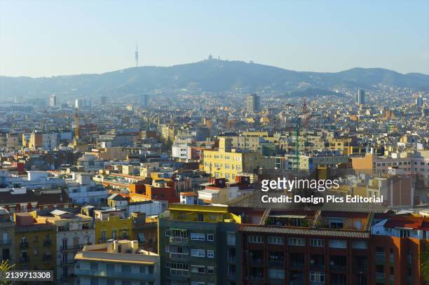 Cityscape of Barcelona With Mountains In The Distance. Barcelona, Spain.