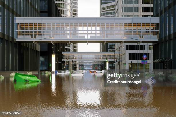 flooded street with cars and garbage bins floating on water - flood stock pictures, royalty-free photos & images