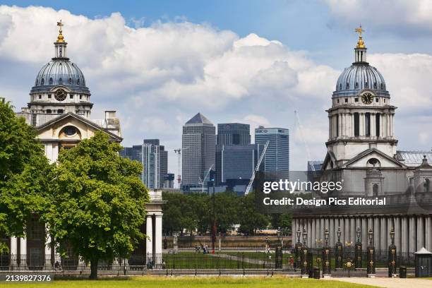 Towers of The Old Royal Naval College With Modern Canary Wharf In The Background. London, England.