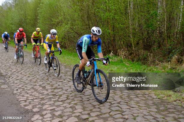 French cyclist, who currently rides for UCI WorldTeam DecathlonAG2R La Mondiale Damien Touze rushes onto the paved road 'La Dreve des Boules d'Hérin'...