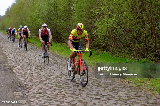 Belgian cyclist, who currently rides for Bingoal Pauwels Sauces WB Aaron Van der Beken rushes onto the paved road 'La Dreve des Boules d'Hérin' known...